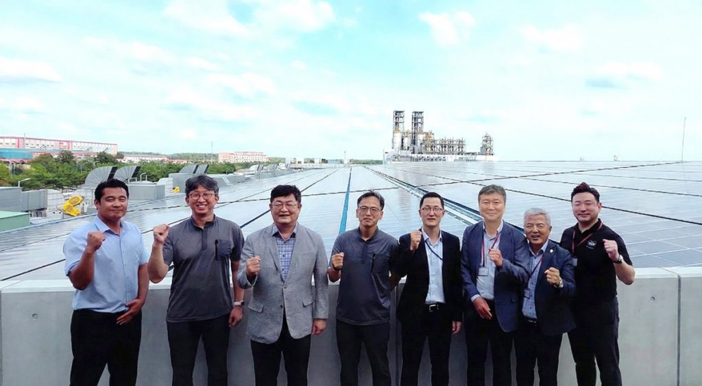 Delegates at the commercial operation ceremony of the rooftop solar project at Kolon Industries.